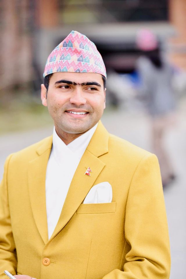 In a dhaka topi and daura