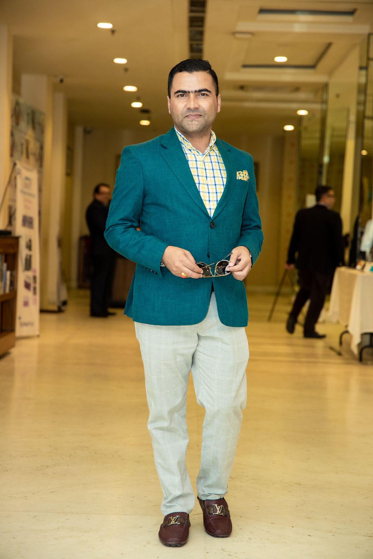 Badri Raj Timalsina in a teal blazer