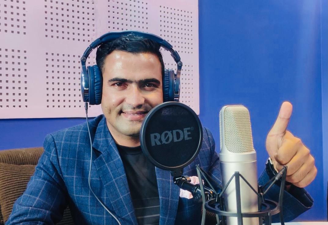 Badri Raj Timalsina at the microphone